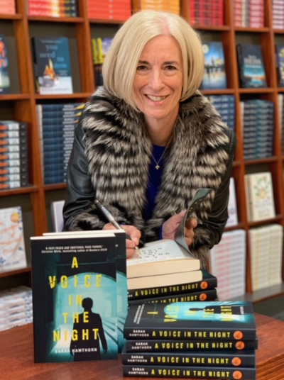Sarah Hawthorn signing books